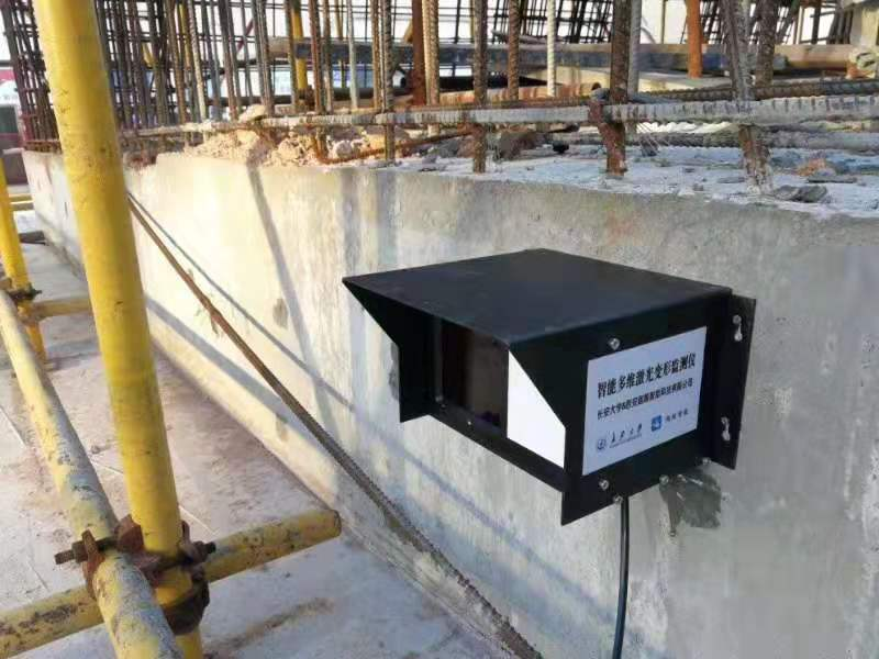 Intelligent Networked Laser Monitoring System for Multidimensional Building Settlement and Deformation Technical Services